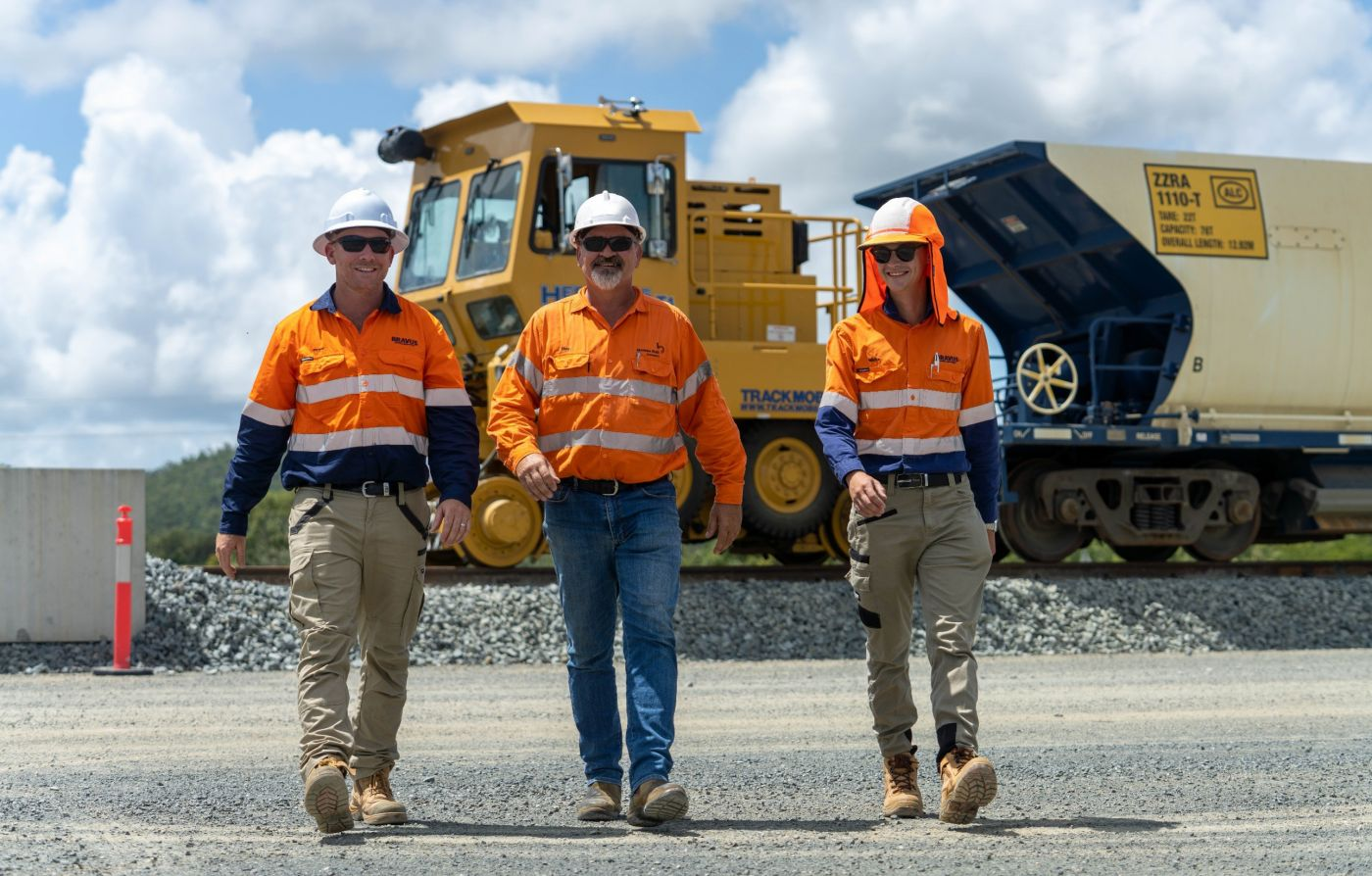 Two Corevale engineers reviewing industrial plans at a mining site